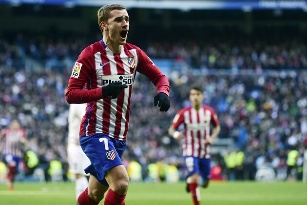 Atletico Madrid's French forward Antoine Griezmann celebrates a goal during the Spanish league football match Real Madrid CF vs Club Atletico de Madrid at the Santiago Bernabeu stadium in Madrid on February 27, 2016. / AFP / PIERRE-PHILIPPE MARCOU        (Photo credit should read PIERRE-PHILIPPE MARCOU/AFP/Getty Images)