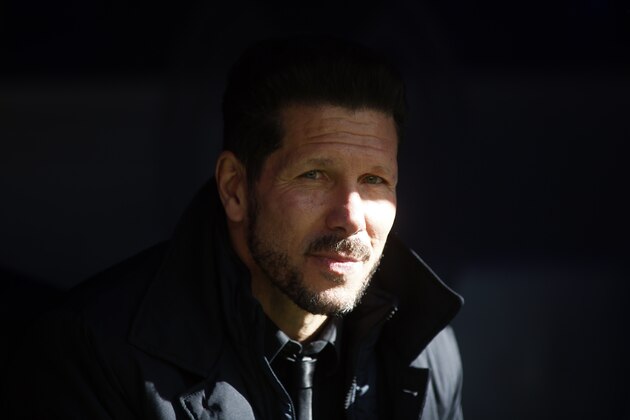 Atletico's coach Diego Simeone watches a Spanish La Liga soccer match between Real Madrid and Atletico Madrid at the Santiago Bernabeu stadium in Madrid, Spain, Saturday Feb. 27, 2016. (AP Photo/Oscar del Pozo)