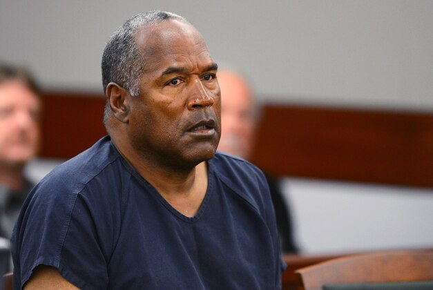 FILE - In this May 14, 2013, file photo, O.J. Simpson appears at an evidentiary hearing in Clark County District Court in Las Vegas. A lawyer for Simpson says the imprisoned former football star isn't happy with ads and interviews about a cable TV series focusing on his 1995 murder acquittal in Los Angeles, but he's not upset about the way he's depicted. (Ethan Miller via AP, Pool)