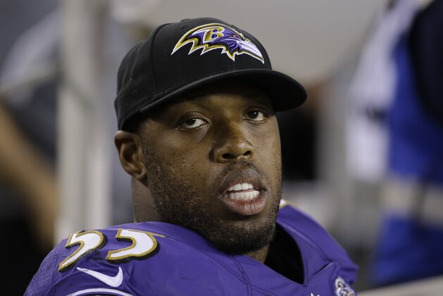Baltimore Ravens' Terrell Suggs sits on the bench during the second half of a preseason NFL football game against the Philadelphia Eagles, Saturday, Aug. 22, 2015, in Philadelphia. (AP Photo/Matt Rourke)