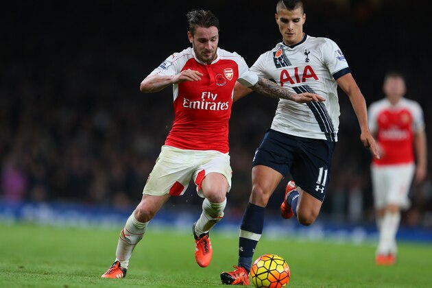 LONDON, ENGLAND - NOVEMBER 08:  Mathieu Debuchy of Arsenal and Erik Lamela of Tottenham Hotspur during the Barclays Premier League match between Arsenal and Tottenham Hotspur at Emirates Stadium on November 8, 2015 in London, England.  (Photo by Catherine Ivill - AMA/Getty Images)