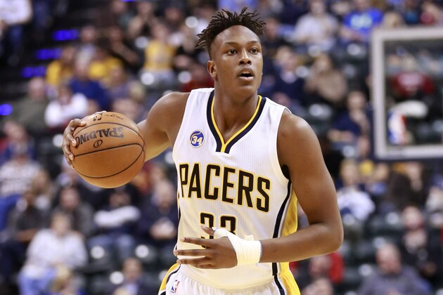 Indiana Pacers forward Myles Turner controls the basketball against the Charlotte Hornets in the second half of an NBA basketball game, Friday, Feb. 26, 2016, in Indianapolis. Charlotte won 96-95.  (AP Photo/R Brent Smith)