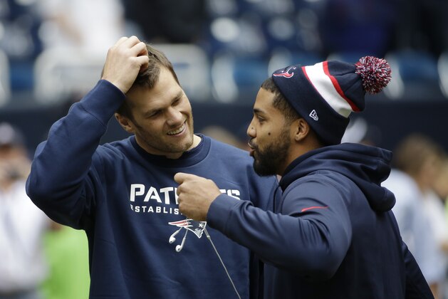 Houston Texans' Arian Foster, right, talks with New England Patriots' Tom Brady, left, before an NFL football game Sunday, Dec. 1, 2013, in Houston. (AP Photo/David J. Phillip) Houston Texans' Arian Foster, right, talks with New England Patriots' Tom Brady, left, before an NFL football game Sunday, Dec. 1, 2013, in Houston. (AP Photo/David J. Phillip)
