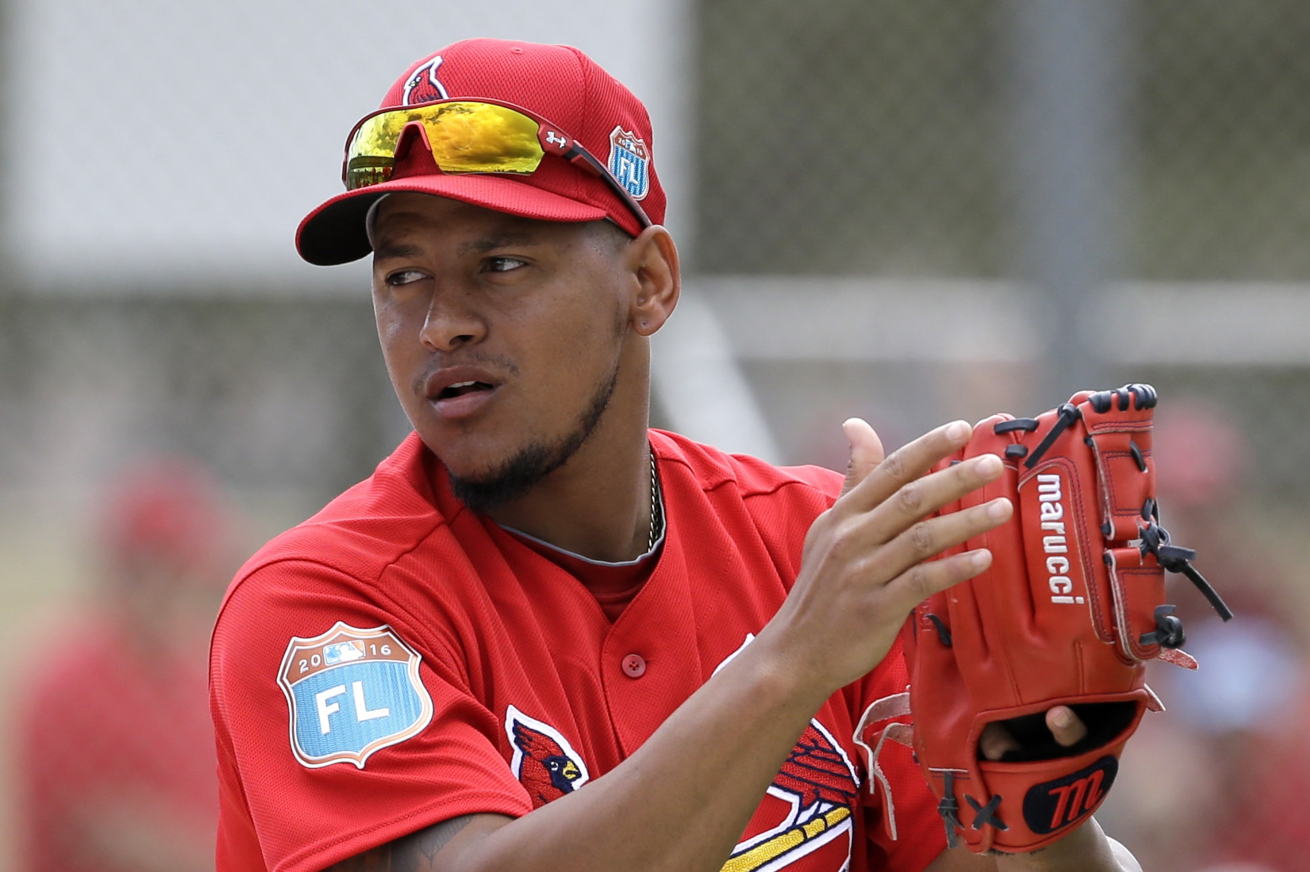 St. Louis Cardinals' Carlos Martinez cheers on his team during spring training intrasquad baseball game Monday, Feb. 29, 2016, in Jupiter, Fla. (AP Photo/Jeff Roberson)