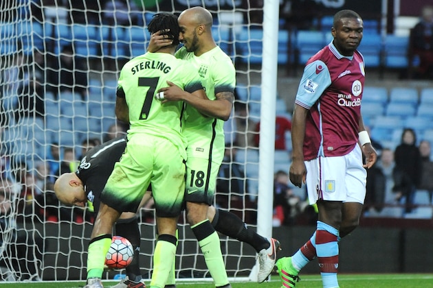 Manchester City’s Fabian Delph, center right, congratulates teammate Raheem Sterling after he scored against Aston Villa during the English FA Cup fourth round soccer match between Aston Villa and Manchester City at Villa Park in Birmingham, England, Saturday, Jan. 30, 2016. (AP Photo/Rui Vieira)