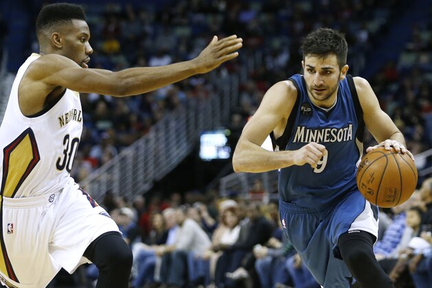 Minnesota Timberwolves guard Ricky Rubio (9) drives against New Orleans Pelicans guard Norris Cole (30) during the second half of an NBA basketball game Saturday, Feb. 27, 2016, in New Orleans. The Timberwolves won 112-110. (AP Photo/Jonathan Bachman)