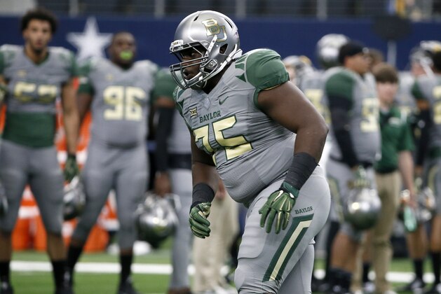 Baylor defensive tackle Andrew Billings participates in warm up drills before an NCAA college football game against Texas Tech Saturday, Oct. 3, 2015, in Arlington, Texas. (AP Photo/Tony Gutierrez)