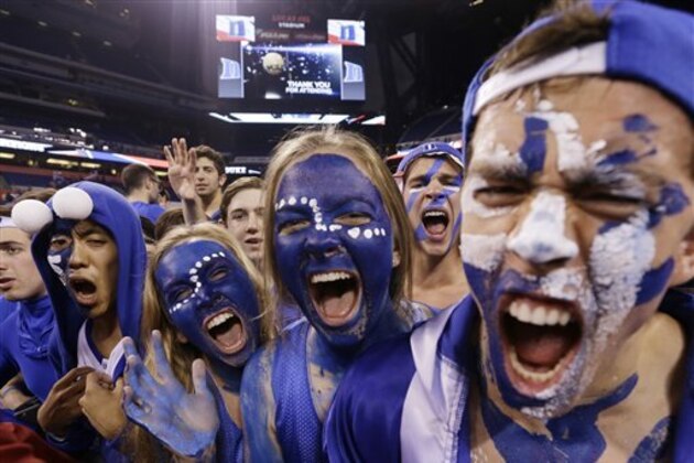 Duke fans celebrate after their team's 68-63 victory over Wisconsin in the NCAA Final Four college basketball tournament championship game Monday, April 6, 2015, in Indianapolis. (AP Photo/David J. Phillip)