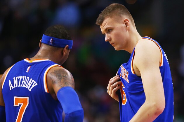 BOSTON, MA - MARCH 04:  Kristaps Porzingis #6 of the New York Knicks talks with Carmelo Anthony #7 during the third quarter against the Boston Celtics at TD Garden on March 4, 2016 in Boston, Massachusetts.NOTE TO USER: User expressly acknowledges and agrees that, by downloading and/or using this photograph, user is consenting to the terms and conditions of the Getty Images License Agreement.  (Photo by Maddie Meyer/Getty Images)
