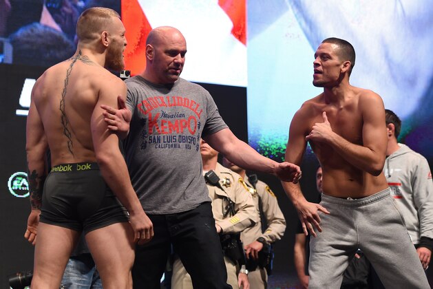 LAS VEGAS, NV - MARCH 04:  (L-R) Opponents Conor McGregor of Ireland and Nate Diaz face off during the UFC 196 Weigh-in at the MGM Grand Garden Arena on March 4, 2016 in Las Vegas, Nevada. (Photo by Josh Hedges/Zuffa LLC/Zuffa LLC via Getty Images)