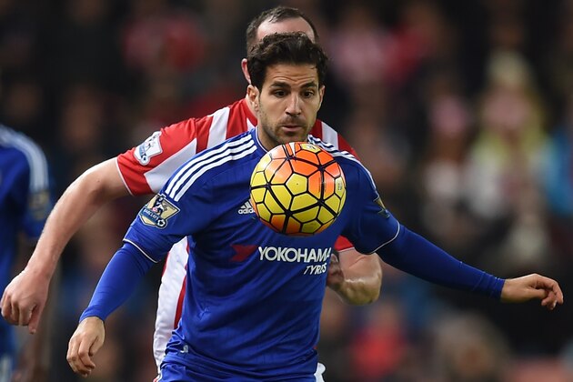 Chelsea's Spanish midfielder Cesc Fabregas controls the ball during the English Premier League football match between Stoke City and Chelsea at the Britannia Stadium in Stoke-on-Trent, central England on November 7, 2015. AFP PHOTO / PAUL ELLIS

RESTRICTED TO EDITORIAL USE. No use with unauthorized audio, video, data, fixture lists, club/league logos or 'live' services. Online in-match use limited to 75 images, no video emulation. No use in betting, games or single club/league/player publications..        (Photo credit should read PAUL ELLIS/AFP/Getty Images)