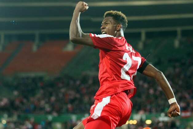 Austria's David Alaba jubilates after scoring during an international friendly soccer match between Austria and Switzerland in Vienna, Austria, Tuesday, Nov. 17, 2015. (AP Photo/Ronald Zak)
