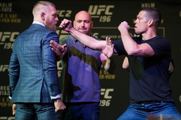 LAS VEGAS, NV - MARCH 3:   (L-R) UFC featherweight champion Conor McGregor and Nate Diaz face off during the UFC 196 Press Conference at David Copperfield Theater in the MGM Grand Hotel/Casino on March 3, 2016 in Las Vegas, Nevada. (Photo by Brandon Magnus/Zuffa LLC/Zuffa LLC via Getty Images)