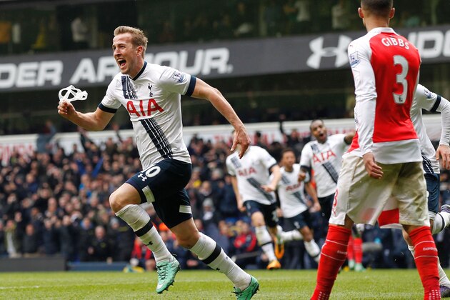 Tottenham Hotspur's English striker Harry Kane (L) celebrates after scoring their second goal during the English Premier League football match between Tottenham Hotspur and Arsenal at White Hart Lane in London, on March 5, 2016. / AFP / IKIMAGES / IKimages / RESTRICTED TO EDITORIAL USE. No use with unauthorized audio, video, data, fixture lists, club/league logos or 'live' services. Online in-match use limited to 45 images, no video emulation. No use in betting, games or single club/league/player publications.        (Photo credit should read IKIMAGES/AFP/Getty Images)