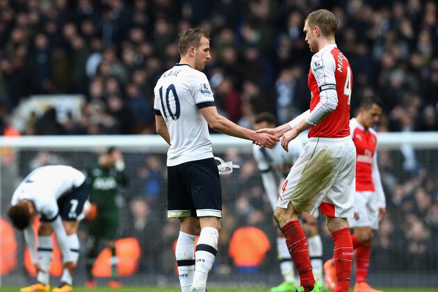 LONDON, ENGLAND - MARCH 05: Harry Kane of Tottenham Hotspur and Per Mertesacker of Arsenal shake hands after their 2-2 draw in the Barclays Premier League match between Tottenham Hotspur and Arsenal at White Hart Lane on March 5, 2016 in London, England.  (Photo by Shaun Botterill/Getty Images)