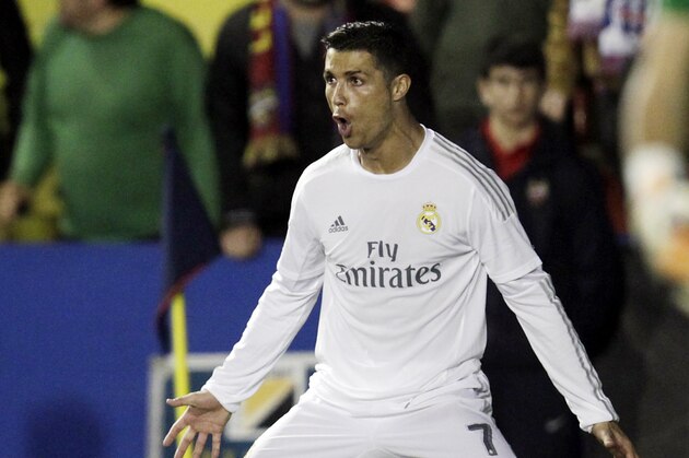 Real Madrid's Cristiano Ronaldo celebrates after scoring against Levante during their Spanish La Liga soccer match between Real Madrid and Levante at the Ciutat de Valencia stadium in Valencia, Spain, Wednesday,  March 2, 2016. (AP Photo/Alberto Saiz)