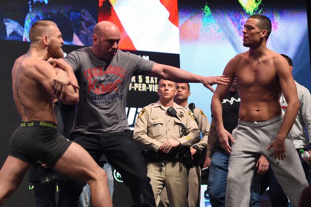 LAS VEGAS, NV - MARCH 04:  (L-R) Opponents Conor McGregor of Ireland and Nate Diaz face off during the UFC 196 Weigh-in at the MGM Grand Garden Arena on March 4, 2016 in Las Vegas, Nevada. (Photo by Josh Hedges/Zuffa LLC/Zuffa LLC via Getty Images)