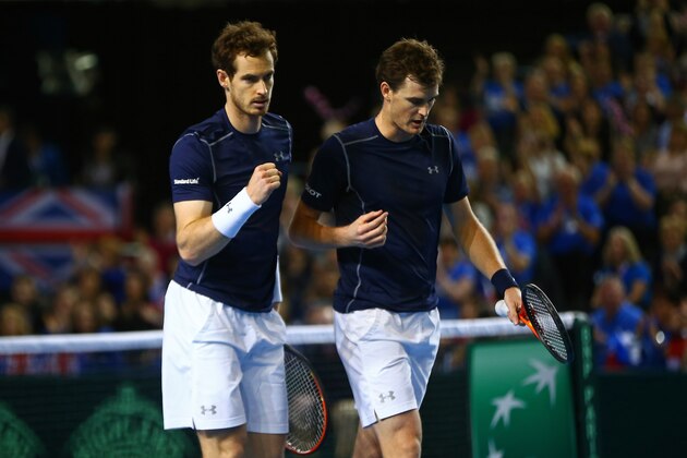 BIRMINGHAM, ENGLAND - MARCH 05:  Andy Murray and Jamie Murray of Great Britain celebrate a point during the doubles match against Yoshihito Nishioka and Yasutaka Uchiyama of Japan on day two of the Davis Cup World Group first round tie at the Barclaycard Arena on March 5, 2016 in Birmingham, England.  (Photo by Jordan Mansfield/Getty Images for LTA)