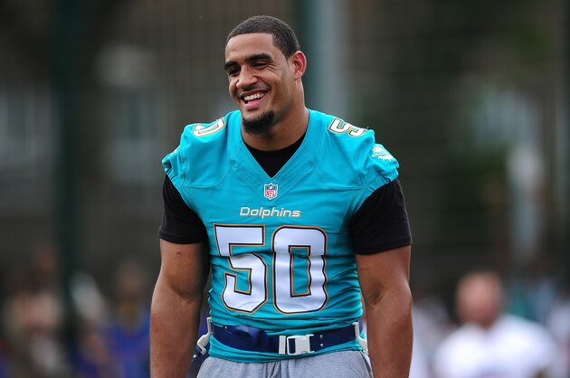 LONDON, ENGLAND - JULY 15: Olivier Vernon of the Miami Dolphins helps to coach a team of local school children during the NFL Launch of the Play 60 scheme at the Black Prince Community Hub on July 15, 2015 in London, England. (Photo by Dan Mullan/Getty Images) LONDON, ENGLAND - JULY 15: Olivier Vernon of the Miami Dolphins helps to coach a team of local school children during the NFL Launch of the Play 60 scheme at the Black Prince Community Hub on July 15, 2015 in London, England. (Photo by Dan Mullan/Getty Images)