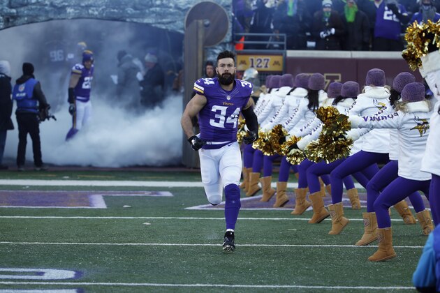 Minnesota Vikings safety Andrew Sendejo (34) is introduced before an NFL wild-card football game against the Seattle Seahawks, Sunday, Jan. 10, 2016, in Minneapolis. (AP Photo/Jim Mone)