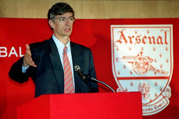New Arsenal boss Frenchman, Arsene Wenger, during a news conference in London, Sunday September 22, 1996 after taking over as manager of the Premier League soccer club. Wenger revealed how he was tempted to join his old protege Glenn Hoddle the England soccer coach as the Football Association's new technical director before accepting the challenge from the Gunners. (AP Photo/Photo/David Cheskin)  --UNITED KINGDOM OUT--