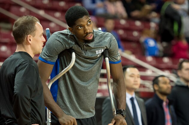 Duke forward Amile Jefferson watches his team warm up before their NCAA college basketball game against Boston College Saturday, Jan. 2, 2016, in Boston. (AP Photo/Gretchen Ertl)