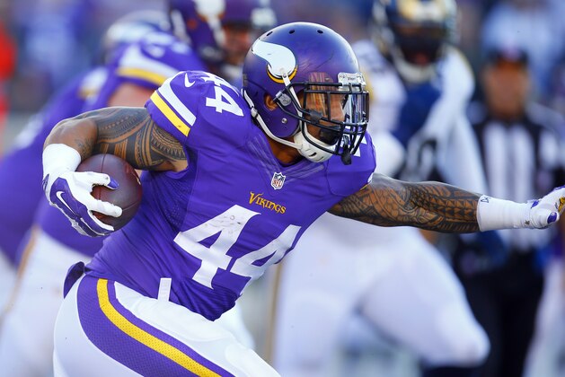 Minnesota Vikings running back Matt Asiata (44) runs the ball against the St. Louis Rams during an NFL football game Sunday, Nov. 8, 2015, in Minneapolis. The Vikings won in overtime, 21-18.  (Jeff Haynes/AP Images for Panini)