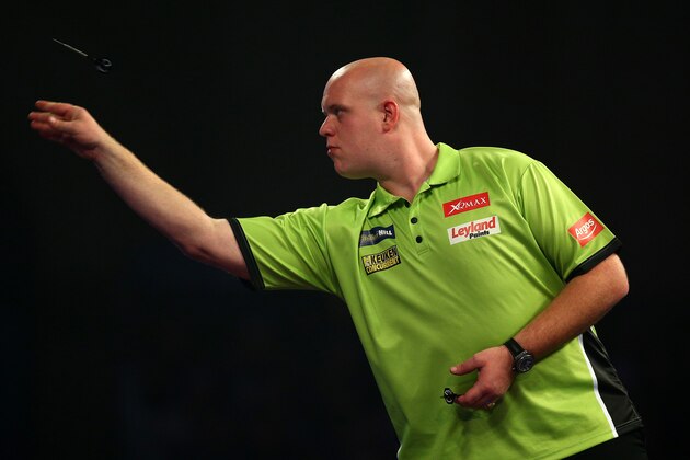 LONDON, ENGLAND - DECEMBER 27: Michael van Gerwen of Holland in action during his second round match against Darren Webster of England during the 2016 William Hill PDC World Darts Championships on Day Nine at Alexandra Palace on December 27, 2015 in London, England. (Photo by Charlie Crowhurst/Getty Images)