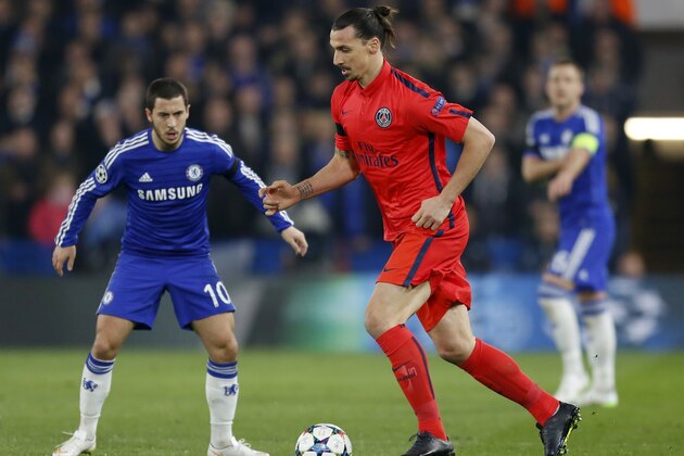 Paris Saint-Germain's Swedish forward Zlatan Ibrahimovic (C) in action during the UEFA Champions League round of 16 second leg football match between Chelsea and Paris Saint-Germain at Stamford Bridge in London on March 11, 2015.  AFP PHOTO / IAN KINGTON        (Photo credit should read IAN KINGTON/AFP/Getty Images)