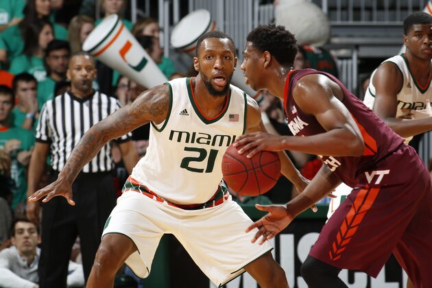 CORAL GABLES, FL - FEBRUARY 17: Kamari Murphy #21 of the Miami Hurricanes defends against Justin Bibbs #10 of the Virginia Tech Hokies on February 17, 2016 at the BankUnited Center in Coral Gables, Florida. Miami defeated Virginia Tech 65-49. (Photo by Joel Auerbach/Getty Images)