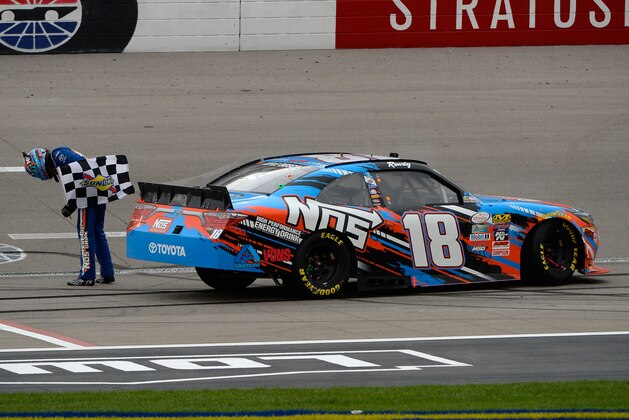 LAS VEGAS, NV - MARCH 05:  Kyle Busch, driver of the #18 NOS Energy Drink Toyota, celebrates with the checkered flag after winning the NASCAR Xfinity Series Boyd Gaming 300 at Las Vegas Motor Speedway on March 5, 2016 in Las Vegas, Nevada.  (Photo by Robert Laberge/Getty Images)