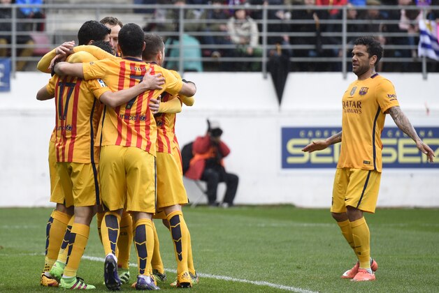 Barcelona's Brazilian defender Dani Alves (R) joins his teammates as they celebrate after scoring during the Spanish league football match SD Eibar vs FC Barcelona at the Ipurua stadium in Eibar on March 6, 2016.
Barcelona'sforward Munir El Haddadi scored the opener / AFP / ANDER GILLENEA (Photo credit should read ANDER GILLENEA/AFP/Getty Images) Barcelona's Brazilian defender Dani Alves (R) joins his teammates as they celebrate after scoring during the Spanish league football match SD Eibar vs FC Barcelona at the Ipurua stadium in Eibar on March 6, 2016.
Barcelona'sforward Munir El Haddadi scored the opener / AFP / ANDER GILLENEA (Photo credit should read ANDER GILLENEA/AFP/Getty Images)