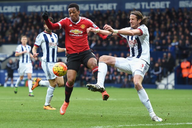 WEST BROMWICH, ENGLAND - MARCH 06: Anthony Martial of Manchester United is challenged by Jonas Olsson of West Bromwich Albion during the Barclays Premier League match between West Bromwich Albion and Manchester United at The Hawthorns on March 6, 2016 in West Bromwich, England.  (Photo by Michael Regan/Getty Images)