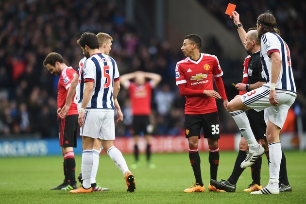 WEST BROMWICH, ENGLAND - MARCH 06: Referee Mike Dean shows the red card to Juan Mata of Manchester United during the Barclays Premier League match between West Bromwich Albion and Manchester United at The Hawthorns on March 6, 2016 in West Bromwich, England.  (Photo by Michael Regan/Getty Images)