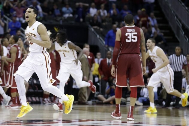 Iowa State guard Naz Long (15) celebrates as at the end of an NCAA college basketball game against Oklahoma in the semifinals of the Big 12 Conference tournament in Kansas City, Mo., Friday, March 13, 2015. Iowa State defeated Oklahoma 67-65. (AP Photo/Orlin Wagner)