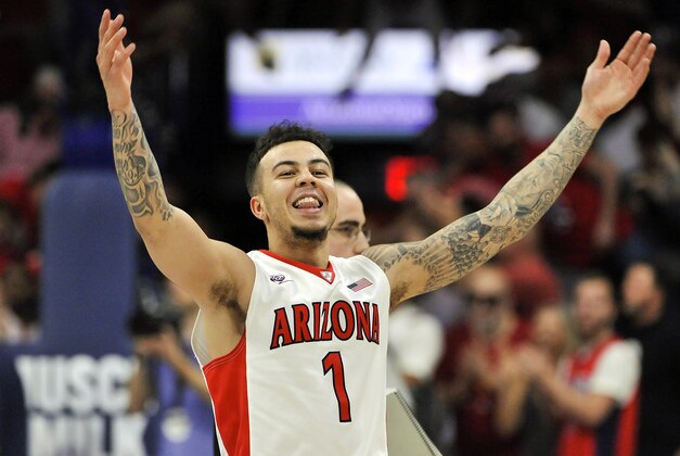 Mar 3, 2016; Tucson, AZ, USA; Arizona Wildcats guard Gabe York (1) signals to the crowd after beating the California Golden Bears at McKale Center. Arizona won 64-61. Mandatory Credit: Casey Sapio-USA TODAY Sports