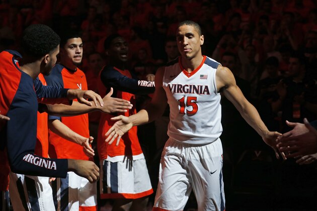 Virginia guard Malcolm Brogdon (15) is introduced before the team's NCAA college basketball game against Louisville in Charlottesville, Va., Saturday, March 5, 2016. (AP Photo/Steve Helber)