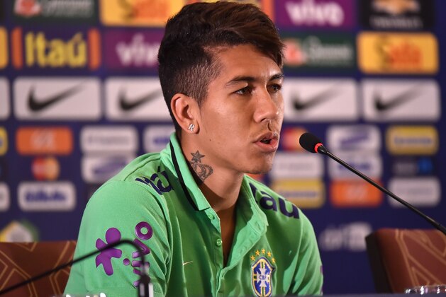 Brazil's player Roberto Firmino speaks during a press conference in Santiago, Chile, on June 23, 2015 during the Copa America 2015. AFP PHOTO / Nelson ALMEIDA        (Photo credit should read NELSON ALMEIDA/AFP/Getty Images)