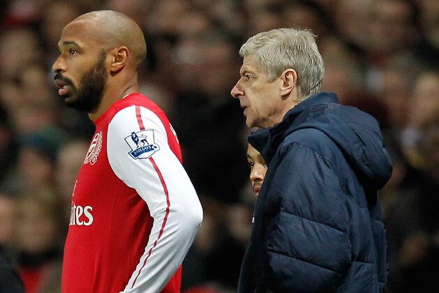 Arsenal's French player Thierry Henry (L) stands next to manager Arsene Wenger as he prepares to substitute for a team-mate during the third round FA Cup football match between Arsenal and Leeds United at The Emirates Stadium in London, on January 9, 2012. AFP PHOTO/IAN KINGTON

RESTRICTED TO EDITORIAL USE. No use with unauthorised audio, video, data, fixture lists, club/league logos or 'live' services. Online in-match use limited to 45 images, no video emulation. No use in betting, games or single club/league/player publications. (Photo credit should read IAN KINGTON/AFP/Getty Images)