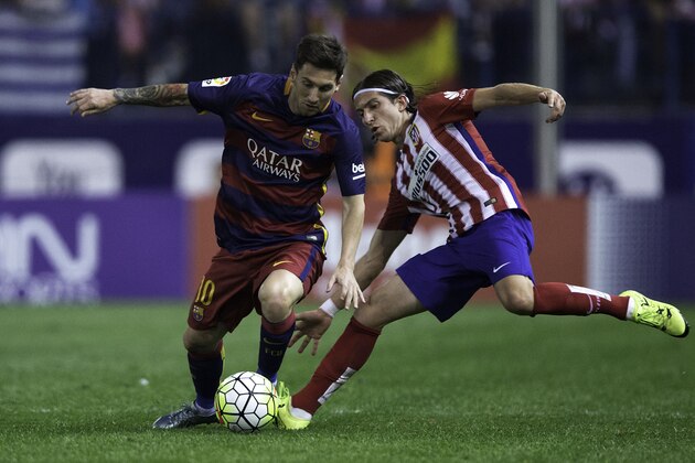 MADRID, SPAIN - SEPTEMBER 12: Lionel Messi (L) of FC Barcelona competes for the ball with Filipe Luis (R) of Atletico de Madrid during the La Liga match between Club Atletico de Madrid and FC Barcelona at Vicente Calderon Stadium on September 12, 2015 in Madrid, Spain. (Photo by Gonzalo Arroyo Moreno/Getty Images) MADRID, SPAIN - SEPTEMBER 12: Lionel Messi (L) of FC Barcelona competes for the ball with Filipe Luis (R) of Atletico de Madrid during the La Liga match between Club Atletico de Madrid and FC Barcelona at Vicente Calderon Stadium on September 12, 2015 in Madrid, Spain. (Photo by Gonzalo Arroyo Moreno/Getty Images)