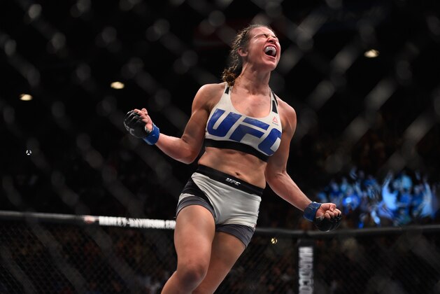 LAS VEGAS, NV - MARCH 05:  Miesha Tate celebrates after defeating Holly Holm during the UFC 196 event inside MGM Grand Garden Arena on March 5, 2016 in Las Vegas, Nevada.  (Photo by Jeff Bottari/Zuffa LLC/Zuffa LLC via Getty Images)