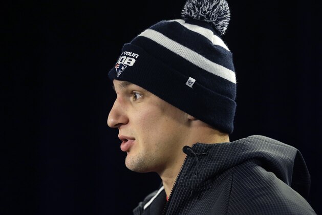 New England Patriots tight end Rob Gronkowski faces reporters before an NFL football practice, Thursday, Jan. 21, 2016, in Foxborough, Mass. The Patriots are to play the Denver Broncos in the AFC Championship on Sunday in Denver. (AP Photo/Steven Senne)