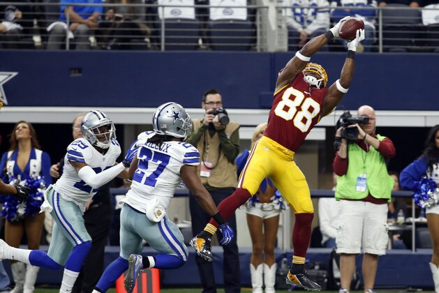 Jan 3, 2016; Arlington, TX, USA; Washington Redskins wide receiver Pierre Garcon (88) catches a pass and scores a touchdown in the first quarter against the Dallas Cowboys at AT&T Stadium. Mandatory Credit: Tim Heitman-USA TODAY Sports