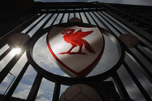 LIVERPOOL, ENGLAND - SEPTEMBER 17:  The  Liverpool Football Club emblem is displayed on the gates of Anfield Stadium on September 17, 2012 in Liverpool, England. In the wake of the Hillsborough files disclosure, families of the victims and support groups are calling for the Attoney General to open new inquests in the city and to pursue any possible criminal prosecutions.  (Photo by Christopher Furlong/Getty Images)