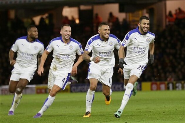 Leicester’s Riyad Mahrez, right, celebrates after scoring a goal, with his teammates, during the English Premier League soccer match between Watford and Leicester City at the Vicarage Road stadium in London, Saturday, March 5, 2016. (AP Photo/Tim Ireland)