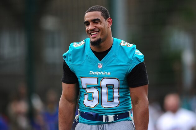 LONDON, ENGLAND - JULY 15:  Olivier Vernon of the Miami Dolphins helps to coach a team of local school children during the NFL Launch of the Play 60 scheme at the Black Prince Community Hub on July 15, 2015 in London, England.  (Photo by Dan Mullan/Getty Images)