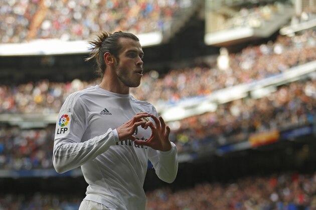 Real Madrid's Gareth Bale celebrates after scoring a goal against Celta during a Spanish La Liga soccer match between Real Madrid and Celta Vigo at the Santiago Bernabeu stadium in Madrid, Saturday, March 5, 2016. Bale scored once in Real Madrid's 7-1 victory.  (AP Photo/Francisco Seco)