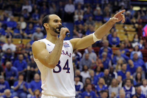 Mar 5, 2016; Lawrence, KS, USA; Kansas Jayhawks forward Perry Ellis (34) talks to the crowd after the senior game against the Iowa State Cyclones at Allen Fieldhouse. Kansas won the game 85-78. Mandatory Credit: John Rieger-USA TODAY Sports