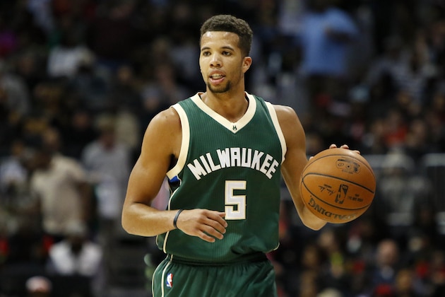 Milwaukee Bucks guard Michael Carter-Williams (5) dribbles against the Atlanta Hawks in the second half of an NBA basketball game, Saturday, Feb. 20, 2016, in Atlanta. Milwaukee won 117-109 in double overtime. (AP Photo/Brett Davis)