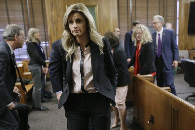 Sportscaster and television host Erin Andrews leaves the courtroom during a break Friday, March 4, 2016, in Nashville, Tenn. Andrews has filed a $75 million lawsuit against the franchise owner and manager of a luxury hotel and a man who admitted to making secret nude recordings of her in 2008. (AP Photo/Mark Humphrey, Pool)